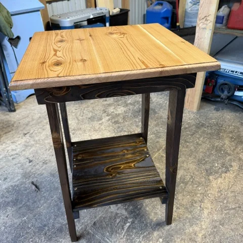 The finished side table from above, showing the tabletop grain