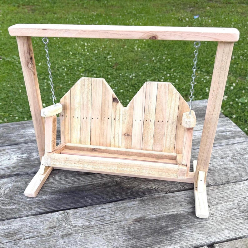 Handmade cedar loveseat swing with stand — the craftsmanship that scales up to full furniture